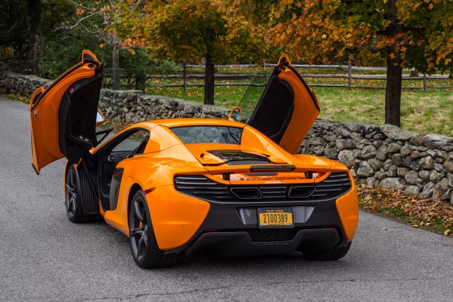 2015 McLaren 650S doors up side 2015 McLaren 650S doors up side